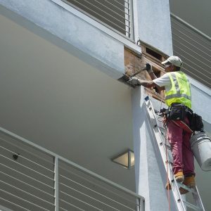 construction person working on balcony