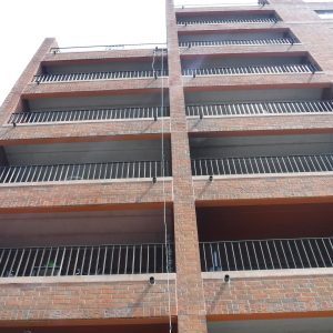 Photo of Brick Building with balconies
