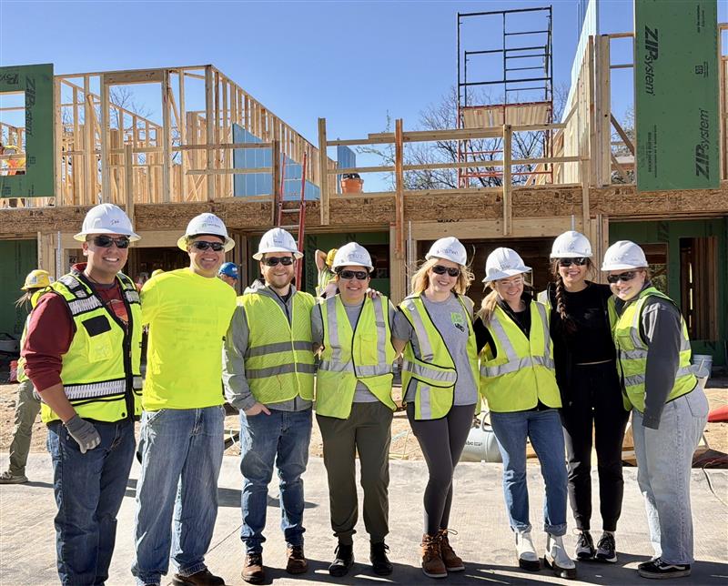 Team LB volunteering in yellow vests and hard hats